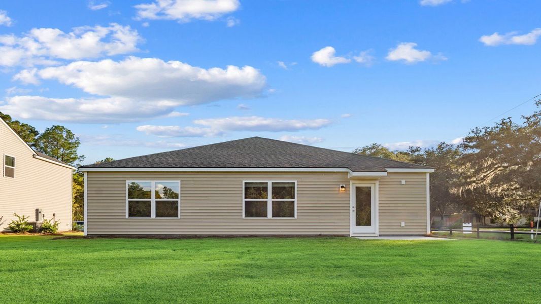 Exterior details and patio area of a home in The Groves at Bees Creek, Ridgeland (Image 4).