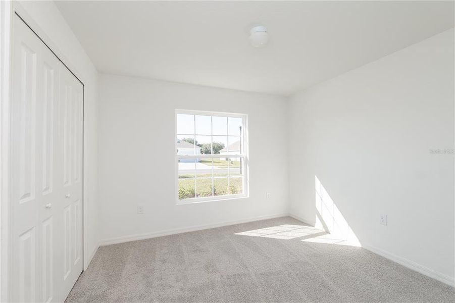 Spacious, unfurnished interior of a new home in Thompson Preserve, Bartow (Image 8).