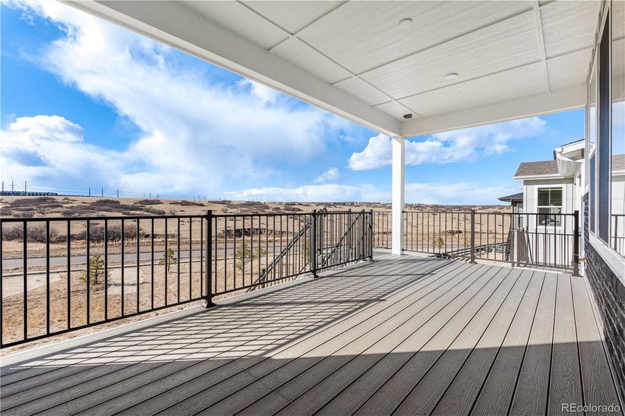 Exterior details and patio area of a home in Gallery at The Canyons, Castle Pines (Image 4).