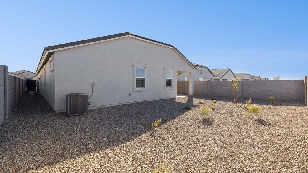 Exterior details and patio area of a home in Desert Moon Estates, Buckeye (Image 23).