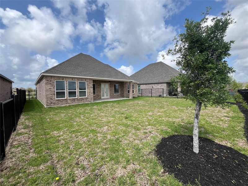 Front exterior of a new home in Sierra Vista, Iowa Colony, TX, highlighting curb appeal (Image 2). Front exterior of a new home in Sierra Vista, Iowa Colony, TX, highlighting curb appeal (Image 2).