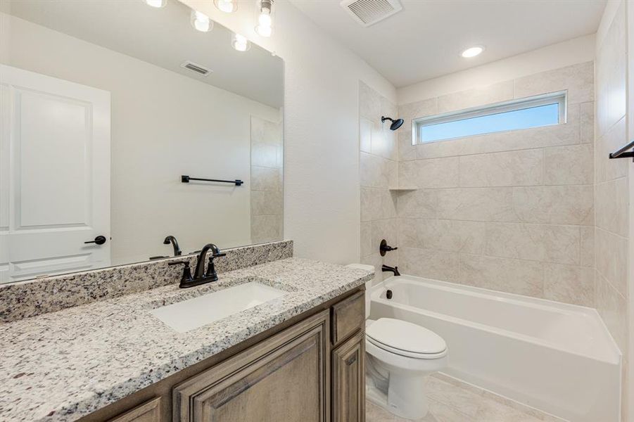Furnished interior view inside a new home in Coyote Crossing, Godley (Image 13).