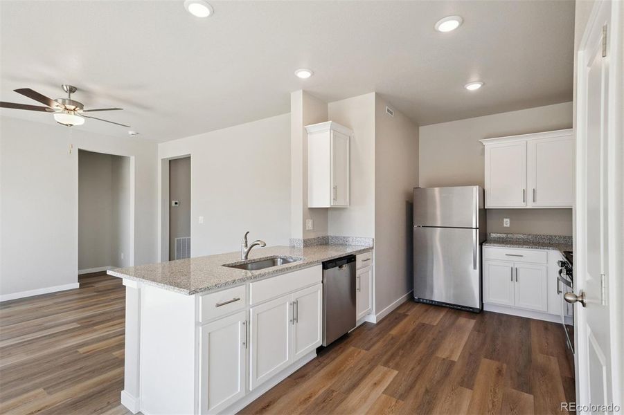 Furnished interior view inside a new home in Cottonwood Greens, Fort Lupton (Image 3).
