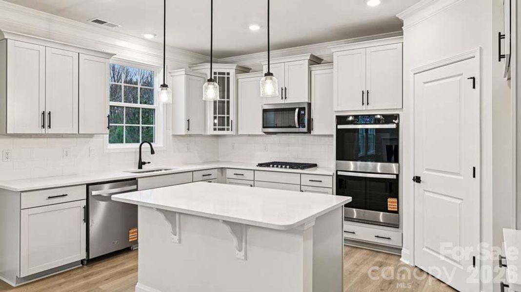 Furnished interior view inside a new home in Sylvan Creek, Denver (Image 5).