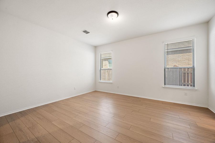 Upgraded LVP Flooring in Primary Bedroom Upgraded LVP Flooring in Primary Bedroom