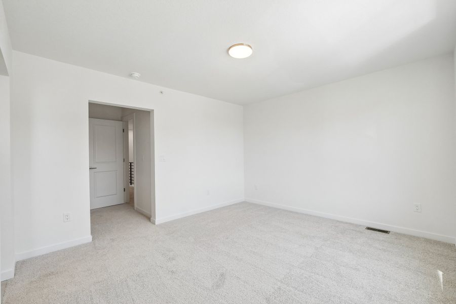 Spacious, unfurnished interior of a new home in The Vistas at West Mesa, Colorado Springs (Image 15).