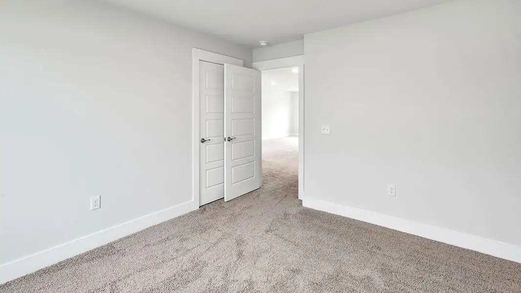 Spacious, unfurnished interior of a new home in The Townes at Cedar Hill Landing, Navassa (Image 27).