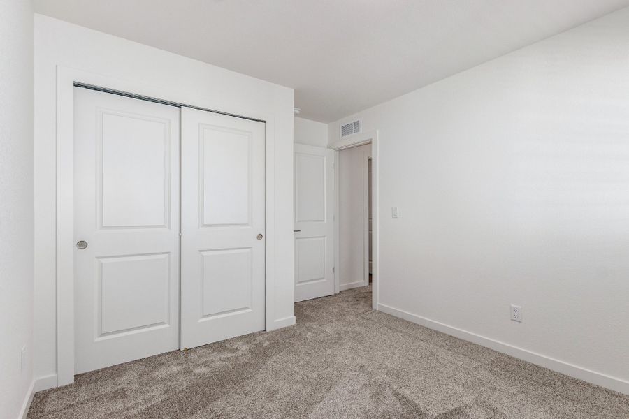 Spacious, unfurnished interior of a new home in Parkside at Victory Ridge, Colorado Springs (Image 25).