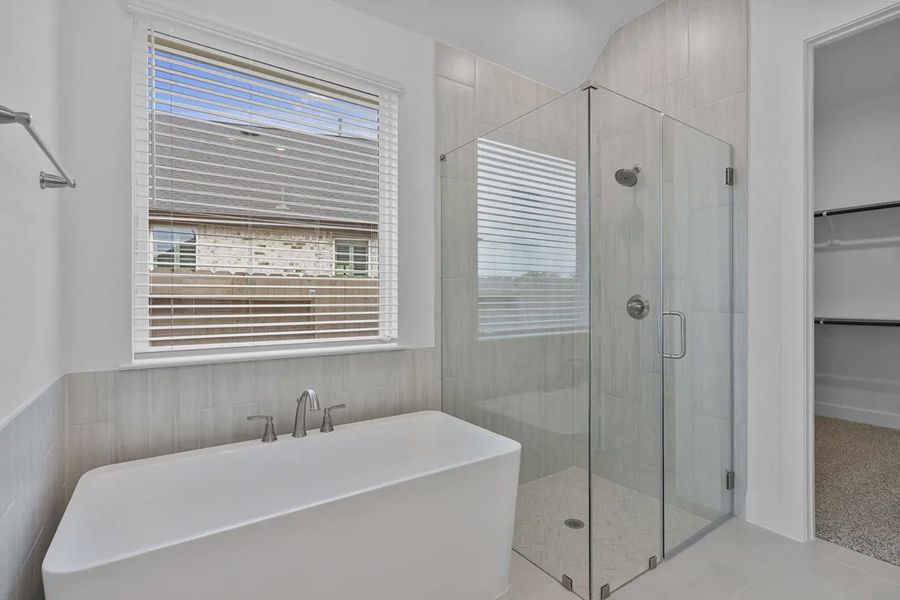 Representative furnished interior of a home built from the Brooks by Chesmar Homes in Grange, Katy (Image 11).