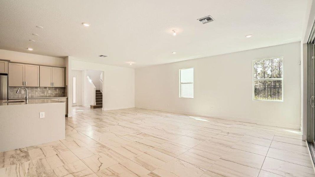 Representative unfurnished interior of a home built from the Ponte Vedra by D.R. Horton in Preserves at Park Trace, Stuart (Image 13).