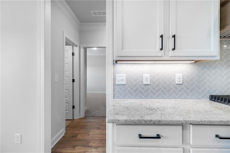 Furnished interior view inside a new home in Calgary Downs, Winder (Image 7).