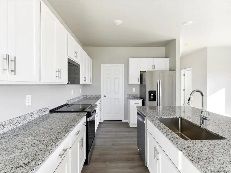 Furnished interior view inside a new home in , Thornton (Image 6).