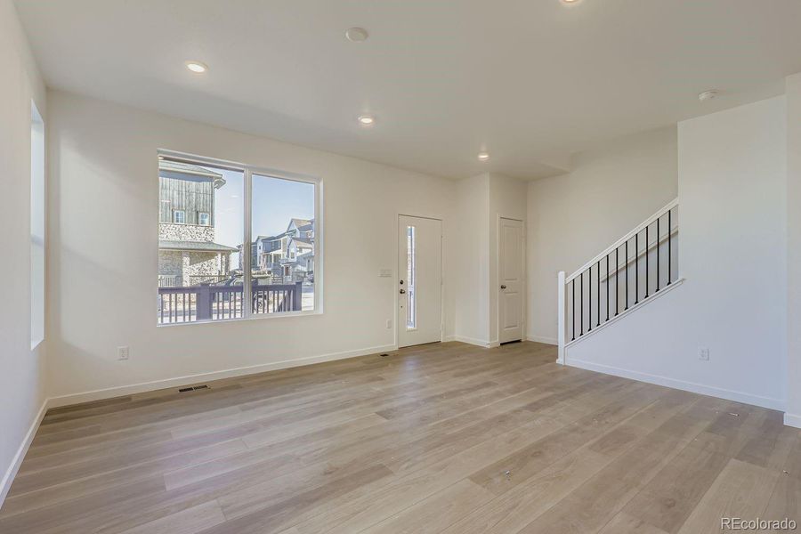 Spacious, unfurnished interior of a new home in Parterre: The Parkside Collection, Thornton (Image 8).