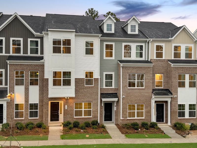 Front exterior of a new home in Renaissance at White Oak, Garner, NC, highlighting curb appeal (Image 1).