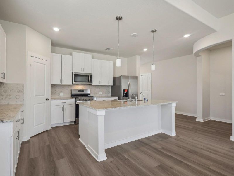 Photo is not of the actual home, but is an inspirational photo of builder’s model home and may depict options, furnishings, and/or decorator features that are not included