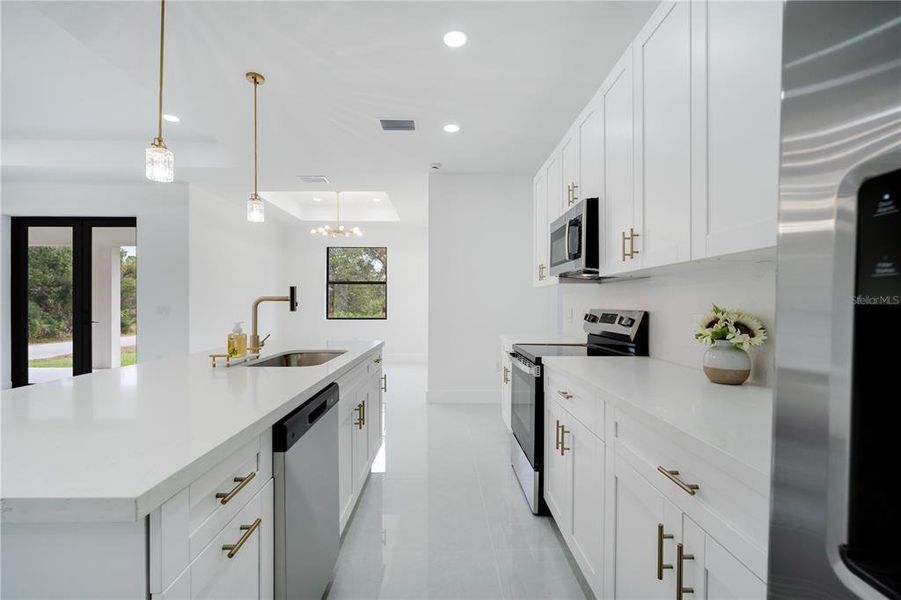 Furnished interior view inside a new home in , Port Charlotte (Image 34).