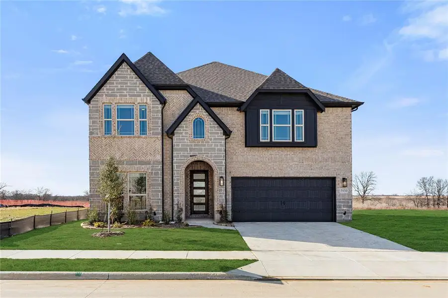 Front exterior of a new home in Creekview Meadows, Pilot Point, TX, highlighting curb appeal (Image 2).