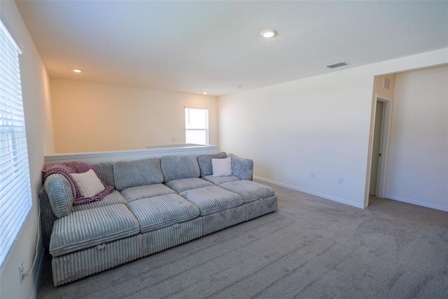 Furnished interior view inside a new home in Harmony at Lake Eloise, Winter Haven (Image 14).