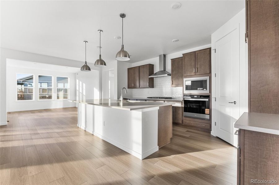 Furnished interior view inside a new home in The Aurora Highlands, Aurora (Image 9).