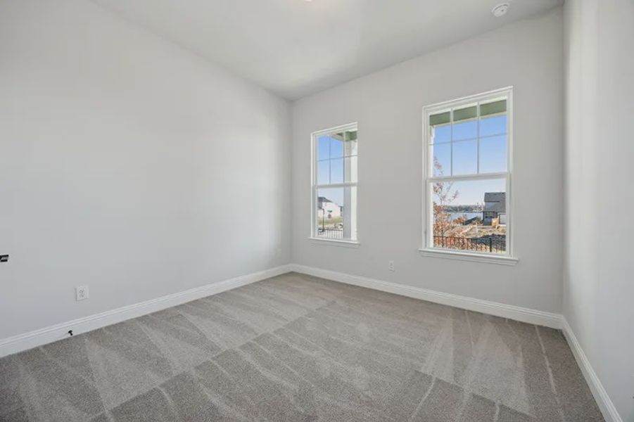 Representative unfurnished interior of a home built from the Peyton by Cambridge Homes in Lake Park, Rowlett (Image 28).