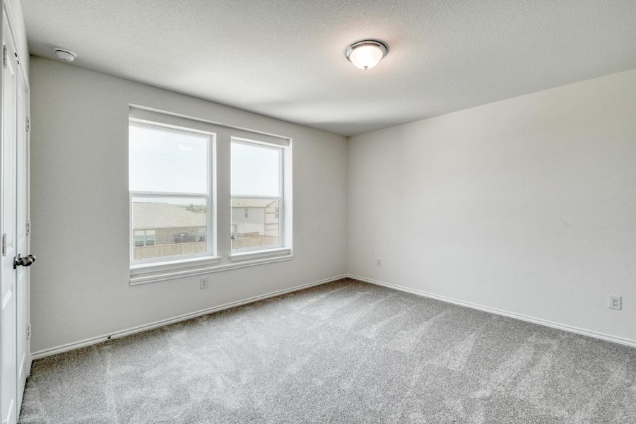 Spacious, unfurnished interior of a new home in Sonterra - Cool Water, Jarrell (Image 21).