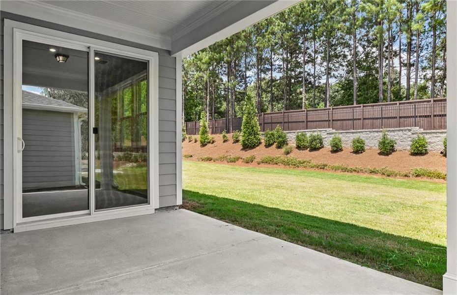 Exterior details and patio area of a home in Sun City Peachtree, Griffin (Image 3).