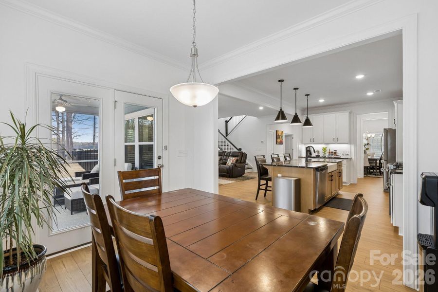 Eat in kitchen leads to screened in porch