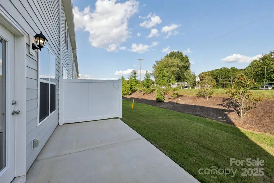 Front exterior of a new home in Blackstone Bay Townhomes, Sherrills Ford, NC, highlighting curb appeal (Image 14).