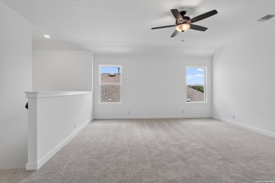 Spacious, unfurnished interior of a new home in Hennersby Hollow, San Antonio (Image 17).