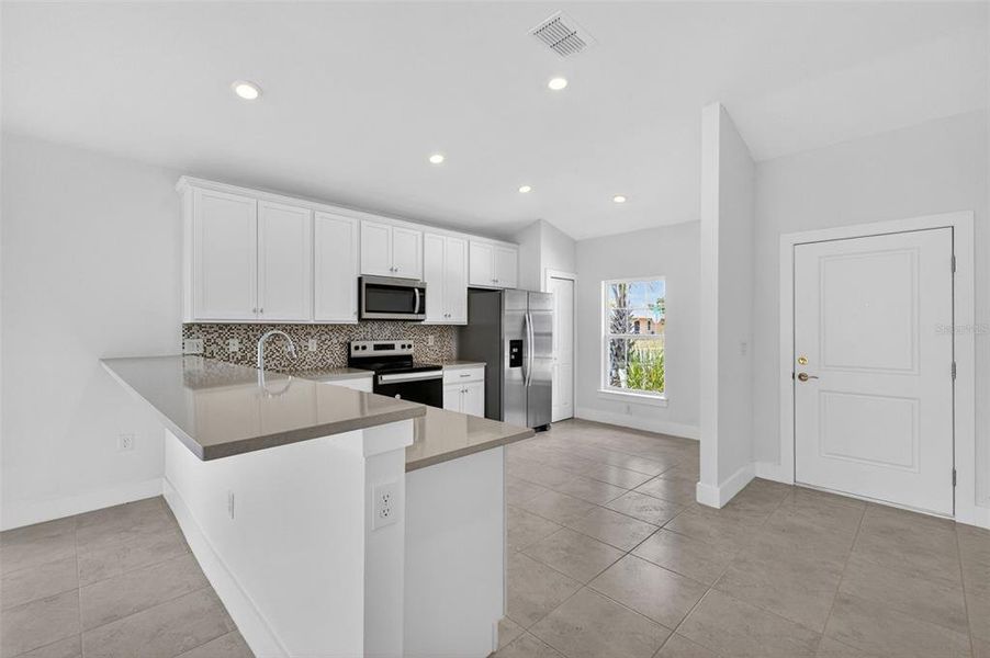 Furnished interior view inside a new home in , Port Charlotte (Image 6).