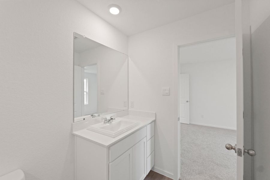 Furnished interior view inside a new home in The Canopies, Splendora (Image 7).