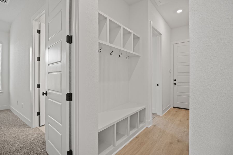 Representative furnished interior of a home built from the Farris by Chesmar Homes in The Grove at Blackhawk, Pflugerville (Image 8).