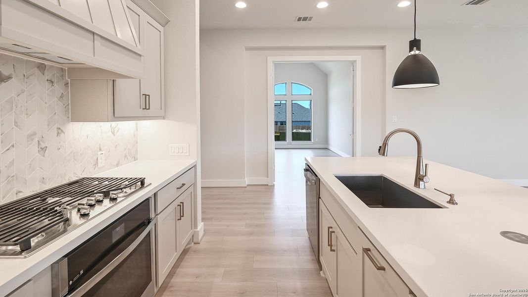 Furnished interior view inside a new home in Cibolo Valley Heights 65', Cibolo (Image 15).