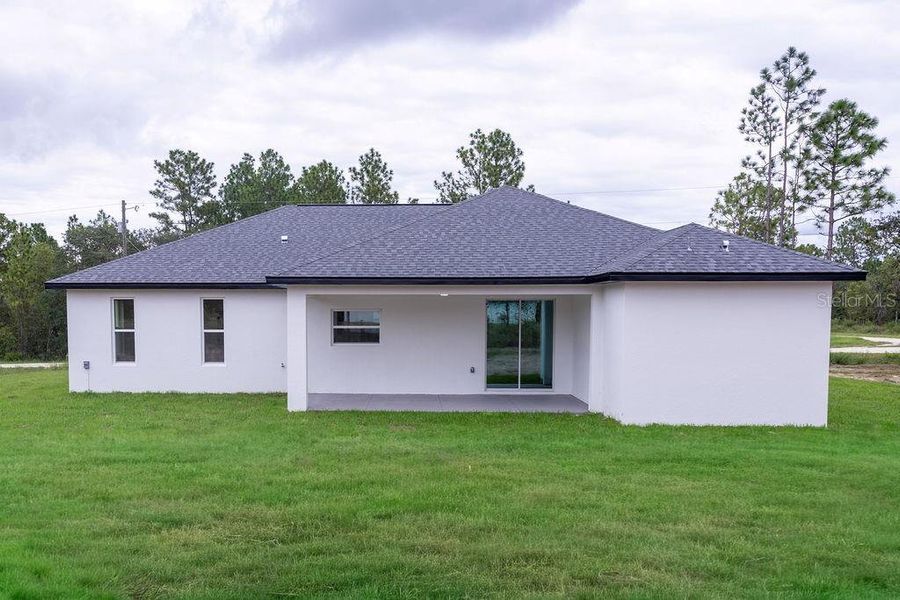 Front exterior of a new home in , Dunnellon, FL, highlighting curb appeal (Image 31). Front exterior of a new home in , Dunnellon, FL, highlighting curb appeal (Image 31).