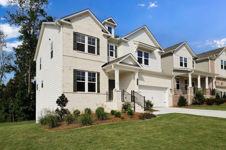 Front exterior of a new home in Falls Creek, Flowery Branch, GA, highlighting curb appeal (Image 19). Front exterior of a new home in Falls Creek, Flowery Branch, GA, highlighting curb appeal (Image 19).