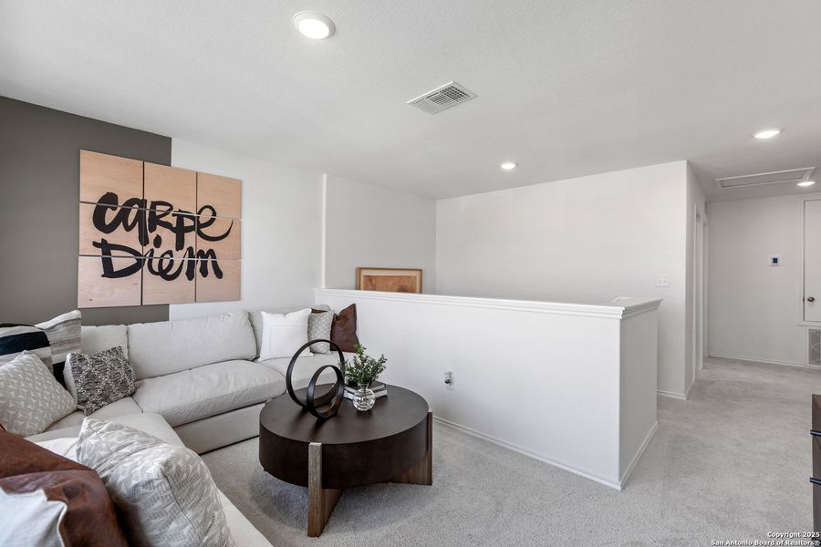 Furnished interior view inside a new home in Dove Song, San Antonio (Image 26).