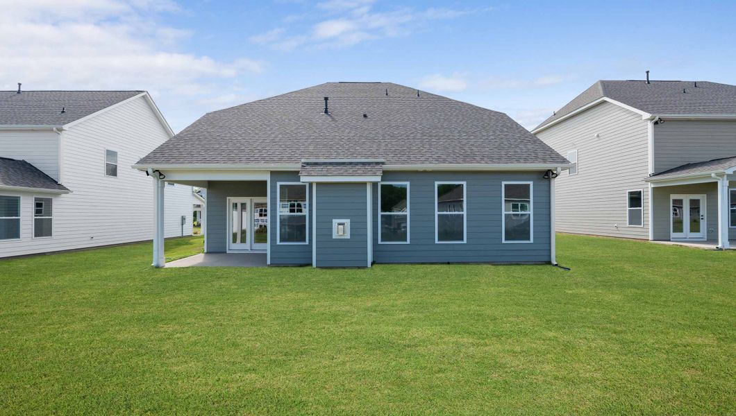 Exterior details and patio area of a home in Whitehawk Meadows, Travelers Rest (Image 3).