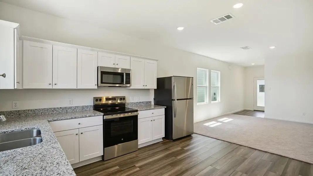Representative furnished interior of a home built from the Atlantis by Starlight Homes in Stonebrooke, Conroe (Image 10). Representative furnished interior of a home built from the Atlantis by Starlight Homes in Stonebrooke, Conroe (Image 10).