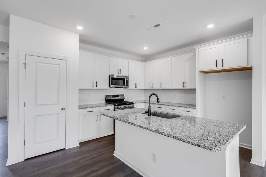 Furnished interior view inside a new home in Magnolia Townes, Wendell (Image 9).