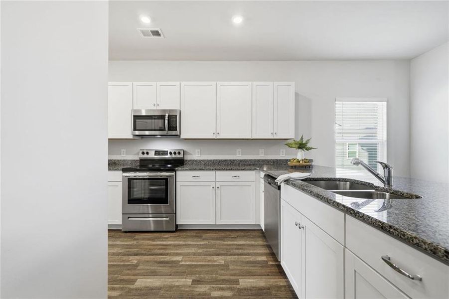 Furnished interior view inside a new home in , Calhoun (Image 11).