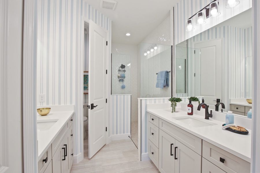 Representative furnished interior of a home built from the Tidewinds 2 by Neal Communities in Boca Royale Golf & Country Club at Wellen Park, Englewood (Image 14).