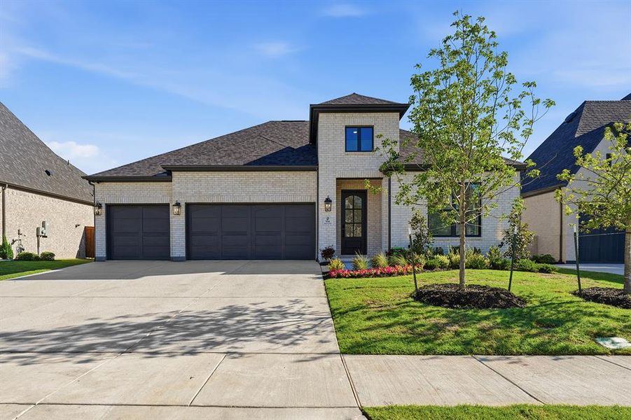 Front exterior of a new home in Quail Hollow, Rockwall, TX, highlighting curb appeal (Image 2). Front exterior of a new home in Quail Hollow, Rockwall, TX, highlighting curb appeal (Image 2).