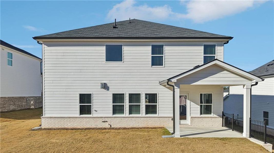 Exterior details and patio area of a home in Parkside at Grayson, Grayson (Image 4).