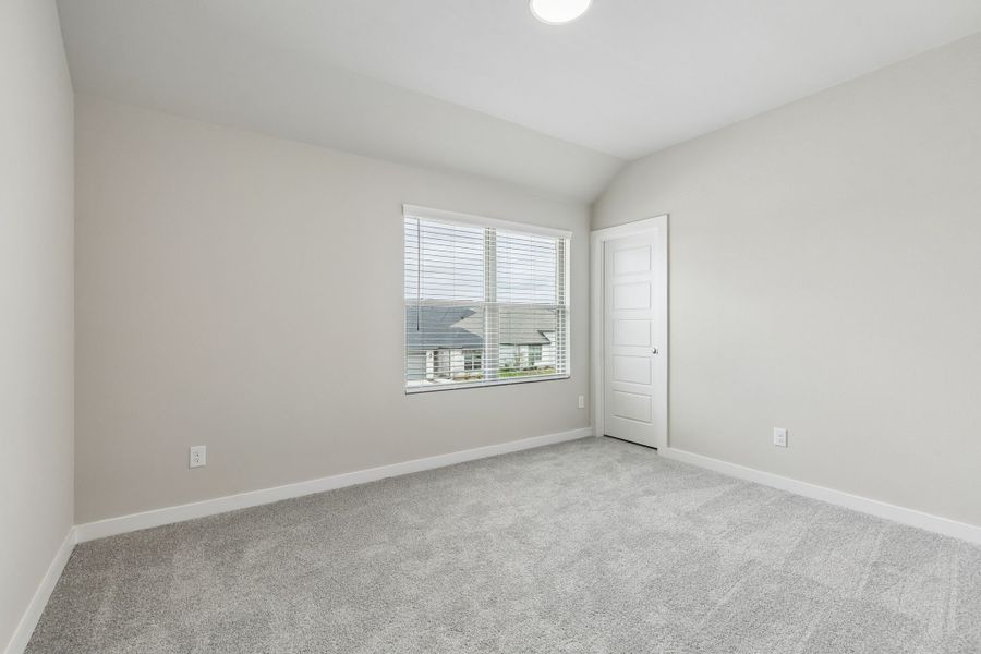 Bedroom in the Winters home plan by Trophy Signature Homes – REPRESENTATIVE PHOTO