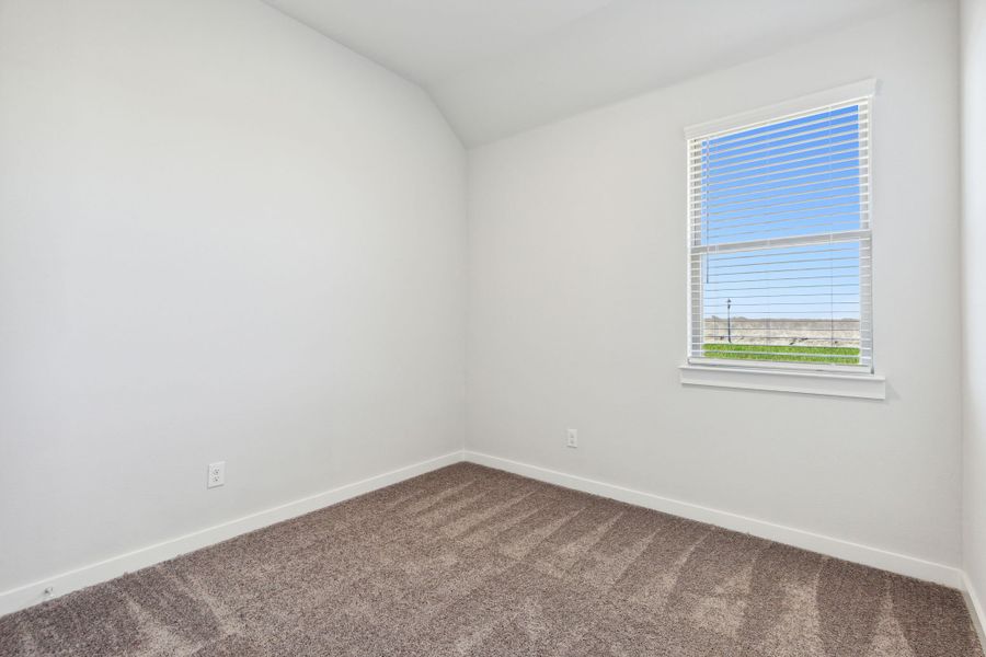 Bedroom in the Ash home plan by Trophy Signature Homes – REPRESENTATIVE PHOTO