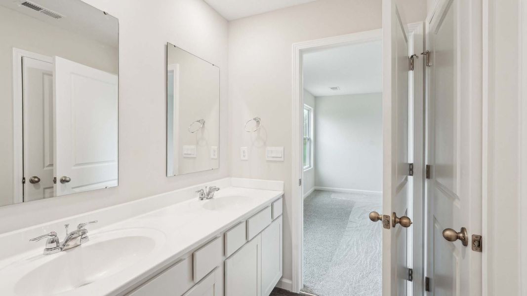 Furnished interior view inside a new home in The Pines at Blake Farm, Wilmington (Image 8).
