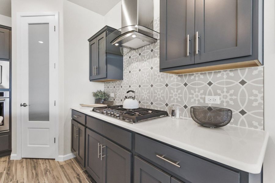 Representative furnished interior of a home built from the Valencia by Hakes Brothers in Hillside Park, El Paso (Image 15).