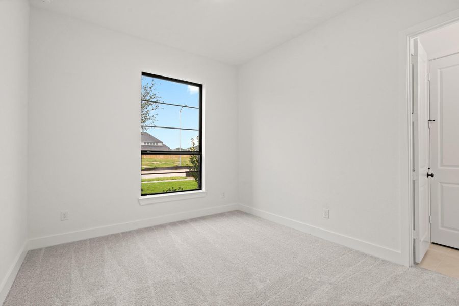 Spacious, unfurnished interior of a new home in Legacy Prairie at Katy Court 60', Katy (Image 8).