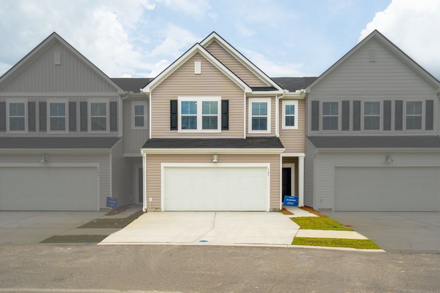 Front exterior of a new home in Dawson Pointe, Summerville, SC, highlighting curb appeal (Image 1). Front exterior of a new home in Dawson Pointe, Summerville, SC, highlighting curb appeal (Image 1).