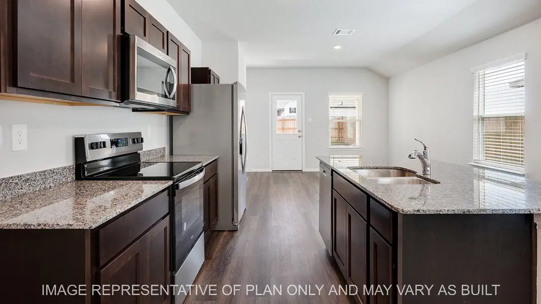 Furnished interior view inside a new home in Midtown Reserve, College Station (Image 5). Furnished interior view inside a new home in Midtown Reserve, College Station (Image 5).